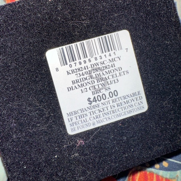 Never worn, have no use for it. Diamond and comes in original box. - Picture 3 of 3